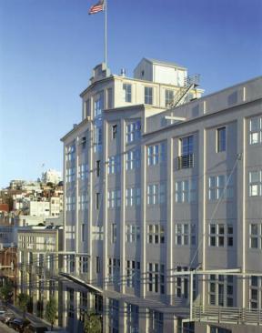 The architects reused the second grain silo as a courtyard entry and used steel and aluminum window openings in context with the vintage character of the original building.