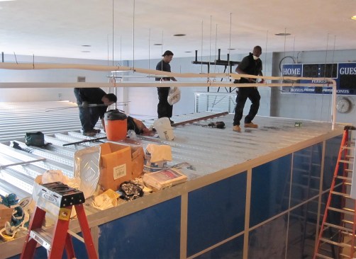 By opening a series of large-scale whiteboard clad sliding doors, this interstitial space can easily transform into a flexible location for a variety of sizable learning situations from dance performances to community meetings.