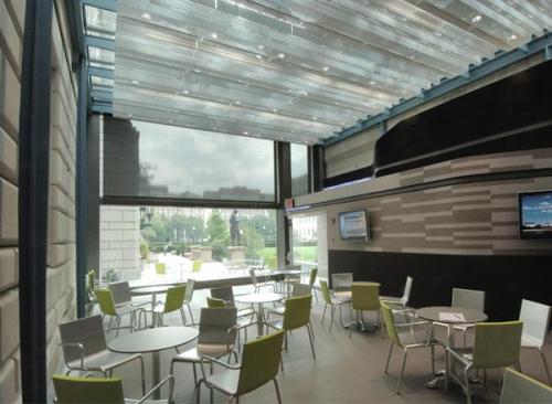 Caf? addition with operable glass wall open