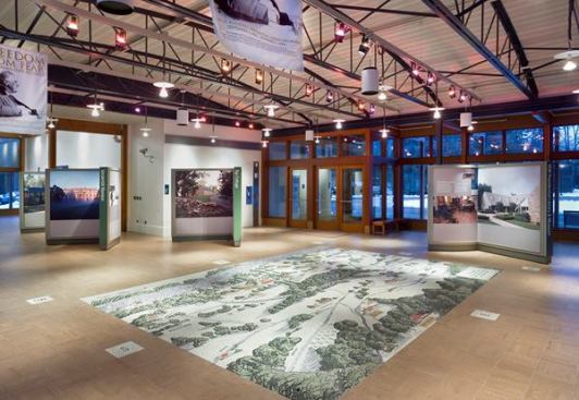 A tile mosaic map inlaid in the floor shows Hyde Park as it appeared in the 1940s.