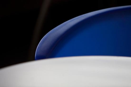 Bantam Chairs shown in Blueberry and Column Tables with Table Tops in Stainless Steel with Sandstone finish at University of California - Davis, Davis, California