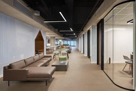 Cafe & Informal meeting lounge space looking at the private office fronts.