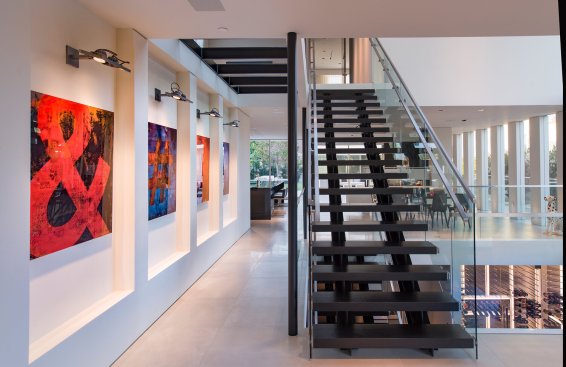 Georgina Avenue Santa Monica modern home art gallery wall and floating stairs