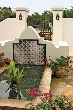 Dos Suenos, San Antonio, Texas – the fountain adds sound and coolness to the enclosed arrival garden