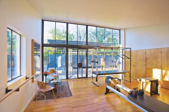 2010 RADA  Pilates Studio and Carport, Dallas Merit Award/Renovation Architect/interior designer: Susan Appleton Architecture, Dallas; Builder: Hammond Remodeling, Sunnyvale, Texas   Given a tight budget, Susan Appleton, AIA, LEED AP, produced an unfussy yet elegant design for this Pilates studio and carport. Even with the custom fabricated steel window wall and other metal work, Appleton kept the cost low by reusing most of the existing garage.