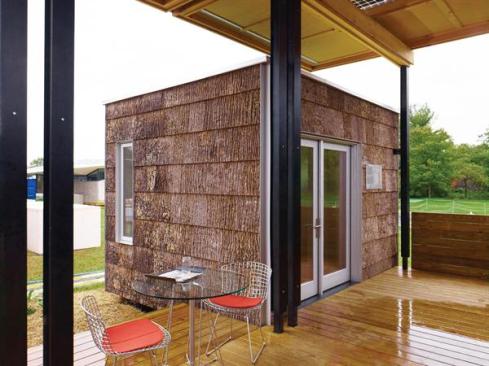 The Solar Homestead features an outdoor porch covered by an 8.2-kilowatt trellis of bifacial solar cells.