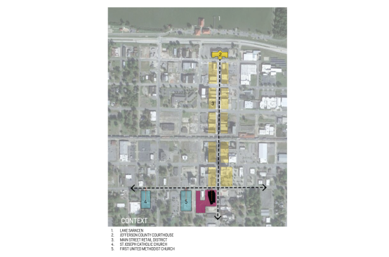 The library anchors a key corner, while being aligned with two historic churches and their classical porticos on W 6th Street. Community, knowledge, and worship all work in context. While the entrance is protected under the cantilevered auditorium, the lifting soffit opens the corner café, computer lab, and teen loft to the intersection.  
