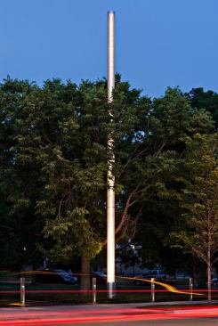 The 40-foot-tall light masts are internally lit by 360-degree light pipes with 3000K 315W T9 ceramic metal halide illuminators located at each base. The base shrouds slide up for maintenance access.