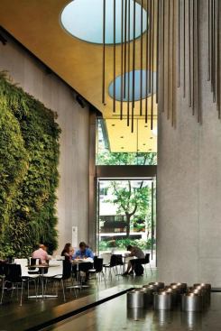 Visitors can sit alongside plant-covered walls.