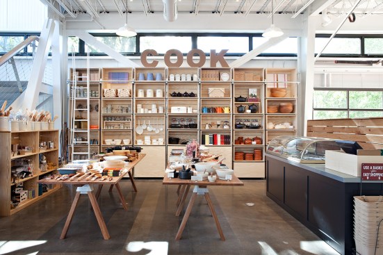 Shed+houses+a+variety+of+programs%2c+from+groceries+to+cooking+utensils%2c+and+from+grab-and-go+foods+to+fresh-cut+cheeses+that+can+be+enjoyed+on+an+overhanging+balcony+above+the+entrance.+