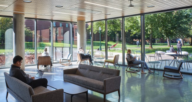 Locally manufactured high-performance glazing illuminates all spaces, including the Commons, a flexible event and community gathering space for students, faculty, alumni, visiting dignitaries and scholars and the local community. UO Tykeson Hall, OFFICE 52 Architecture, Design Architect.