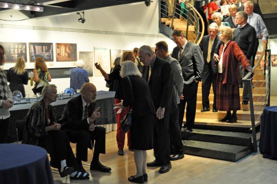 Eric Lloyd Wright greets visitors to the opening of Project Santaranta at the Embassy of Finland.