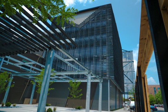 Metal from the old industrial building on the site was recycled into a trellis above the open-air courtyard.