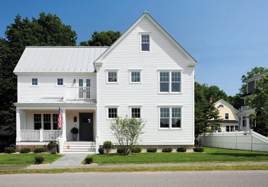 ZeroEnergy Design used a panelized system to create this New England farmhouse in Concord, Mass. Among its many green features are salvaged products, cooling chimney, radiant heating, spray foam insulation, and exterior rigid insulation.