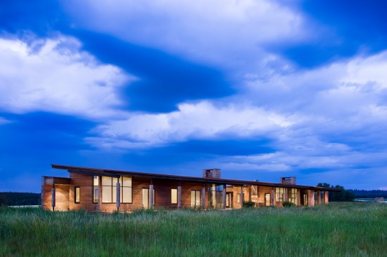 Exterior, horizontal, overall rear 3/4 view from south west at twilight, Earth Wall II, Squirrel, Idaho; Ward + Blake Architects