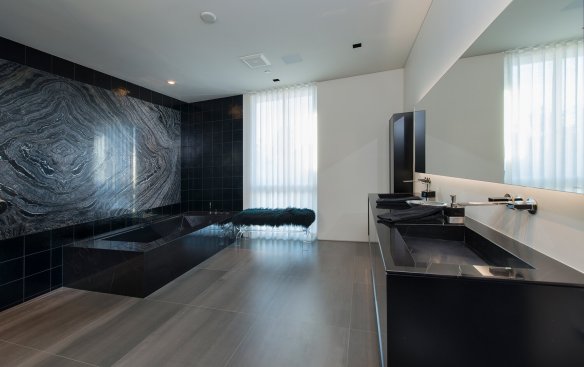 Georgina Avenue Santa Monica modern home luxury bathroom with black marble wall