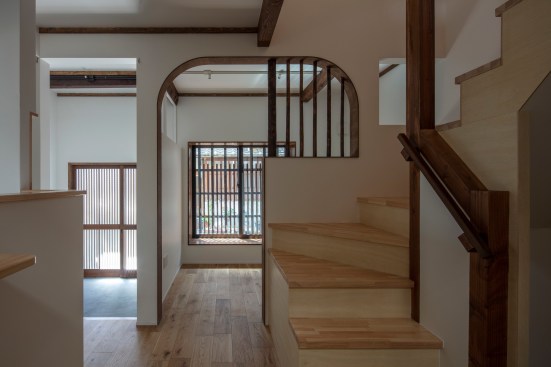 Downstairs view looking towards the entryway and TV/guest room