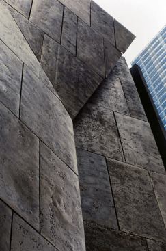 The Folk Art Museum's 85-foot façade, designed specifically to make '
a quiet statement of independence' from MoMA, which surrounds it on three sides, 
may have led to its undoing, if MoMA director Glenn D. Lowry is to be believed.