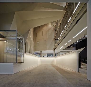 To finish the exposed concrete to pristine smoothness, the architects turned to products like Renderoc.