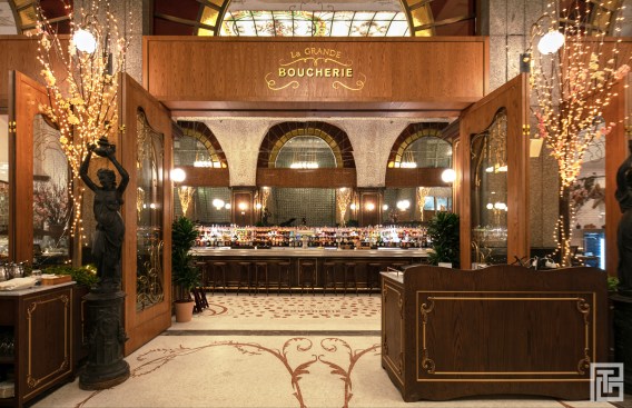 THE ARCADE/
The architecture of the arcade is revitalized into an inviting hidden gem of ornament and spectacle between two existing buildings. A once overlooked pedestrian walkway is reactivated to the public and transformed into a moment of discovery. The arcade synchronously serves as a transition point between the two city streets and the Art Nouveau revival of the restaurant; a mere introduction to the interior space awaiting one’s entry. The floor has been hand-crafted in half inch mosaic Carrara Marble tiles following custom organic patterns. A palette of neutral colors blend with the existing brick flooring and glass wall surroundings. As this space was intended for outdoor use in dining, year-round functionality is also addressed by integrating a heated floor system below the mosaic tiling.