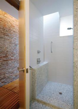 The architects separated the apartment into public spaces up front and private areas in back.