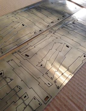 The thermobimetal pieces were lasercut and etched with a number for sorting and installation purposes.