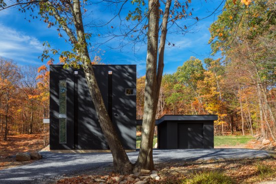 Privacy on the approach side of the home is preserved by restricting openings where possible. Windows at the aerial studio and second floor office were retained to promote air flow and cross ventilation.