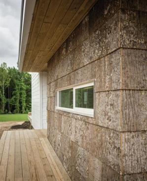 The+houses+feature+NichiProducts+fiber+board+plank+siding+by+Nichiha+and+poplar+bark+siding+by+Highland+Craftsmen.