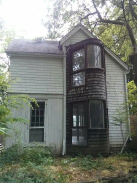 Before photo: Located in the Summerhill neighborhood, the former carriage house is now a single-bedroom residence in Ontario's Saint Clair community.