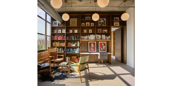 New custom walnut millwork room dividing wall. 