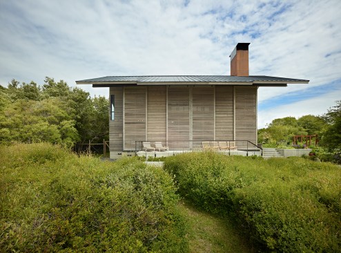 Beach+facade+with+exterior+shutters+shown+in+closed+position.