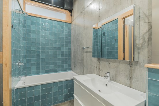 3rd Floor Bathroom with Nemo tiles, Toto Aquia wall-mounted toilet, Grohe fixtures, curly maple wood trim