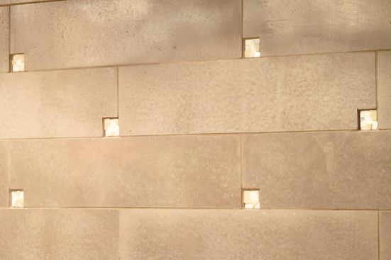 Metal glazed ceramic tile backsplash. Project: Zuckerman Kitchen, San Francisco; Designer/Fabricator: Cheng Design, Berkeley, Calif.