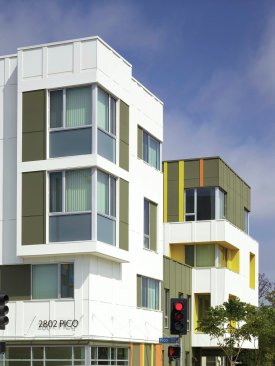 Exterior, showing the corner ground-floor retail space.