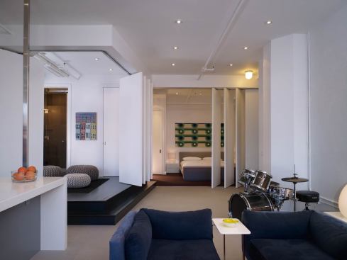 Looking into the raised bedrooms with partitions open.
