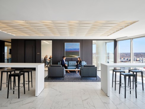 Awash in natural light, the lobby welcomes clients, guests, and staff.
