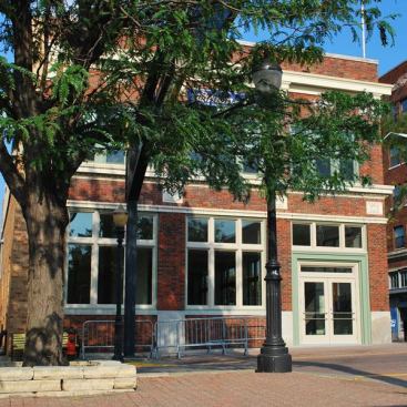 Architect: Susan Richards Johnson, Susan Richards Johnson & Associates, Inc., Kansas City, MO &nbsp; New Marvin windows and entry door bring balance and a natural rhythm to the building's fa&ccedil;ade. This historic property had only a few original wood windows intact, the entry door was completely missing, and moisture infiltration had caused considerable damage.