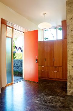The concrete floors in the entryway and living area act as a thermal mass to cool the house in the summer and warm it in winter.