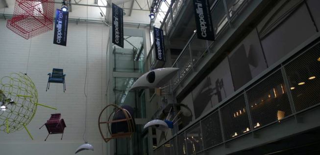 Cappellini chairs hang from the ceiling in the Design Village.