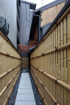 Entrance approach space with new bamboo fences and granite stepping stones