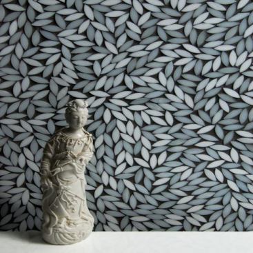 Part of the manufacturer’s Jazz Collection, Foliage is a handcrafted mosaic product that is made from stained glass. The pieces are mounted on an interlocking mesh measuring 14¾ inches by 14¼ inches and can be used on shower and interior walls and light-traffic floor applications. http://artistictile.com.