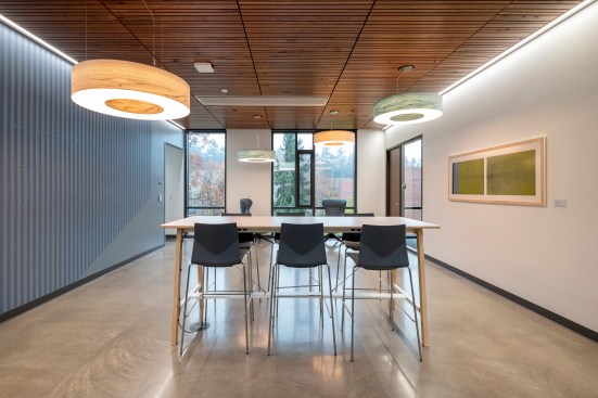 Salvaged Pin Oak trees from the construction site define select public space ceilings and low VOC materials prevail throughout the building. UO Tykeson Hall, OFFICE 52 Architecture, Design Architect.