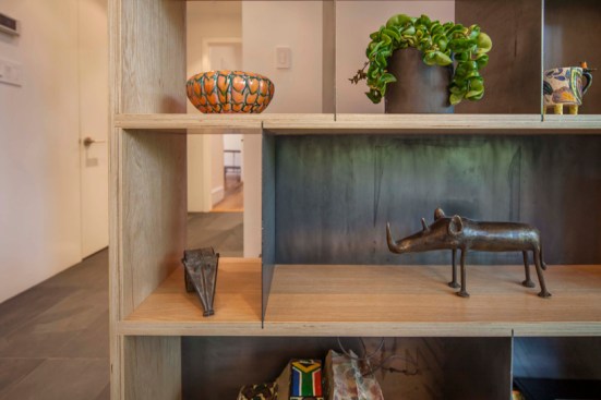 Custom+exposed+edge+plywood+and+steel+shelves