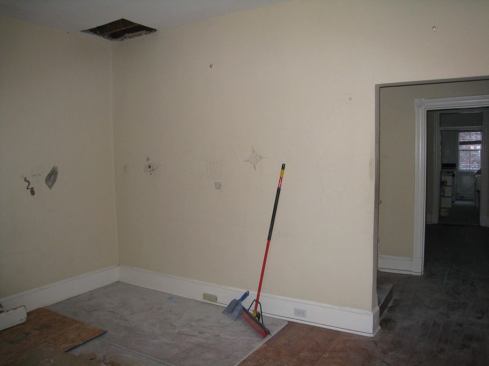 Before: The living room prior to the remodel.   2011 Remodeling Design Awards (September)  Whole-House Remodeling $250,000 – $500,000  Kube Architecture, Washington, D.C.