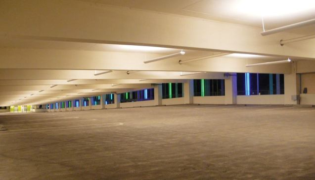 The garage's proximity to municipal buildings necessitated city-required illumination-level increases. To meet these guidelines, the lighting designers selected an indirect/direct 3000K T5HO fluorescent pendant.