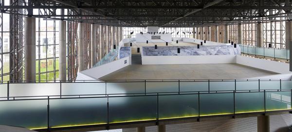 Programmed spaces in the building's center have expansive views outside.