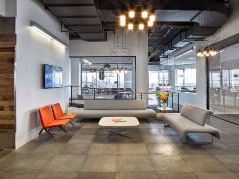 Soft seating in the reception area is by Teknion.