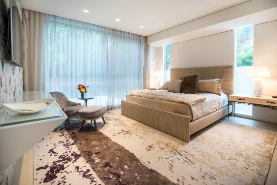 Luxury modern guest bedroom at Beverly Hills home.