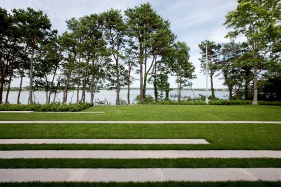 Staggered granite strips provide firm footing and an abstract composition on the ground.