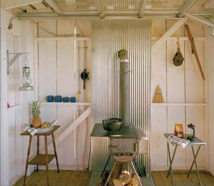 Architect Jeffery Broadhurst built his vacation retreat on weekends with the help of family and friends. The house features such low-tech solutions as a canvas awning for deck shading and stainless steel sheets and bird spikes for rodent control.